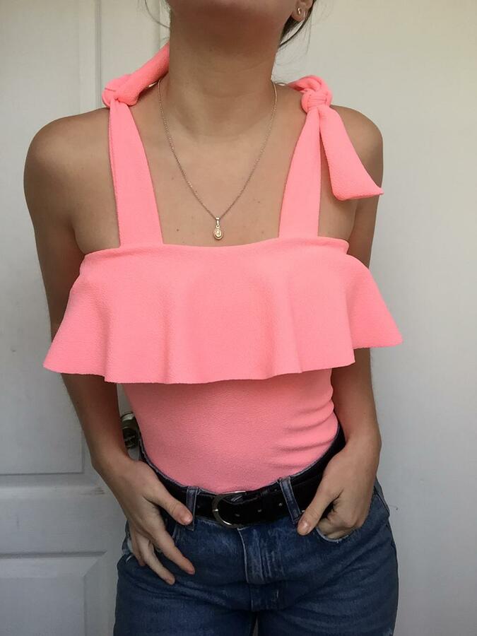 POLERA PRETINA AMARRAS VUELITOS CORAL 